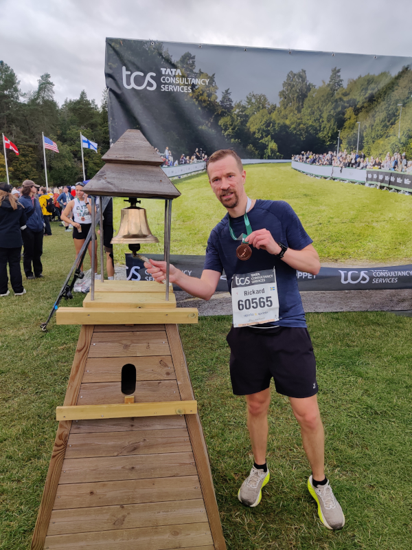 Me ringing the PB bell after the race.